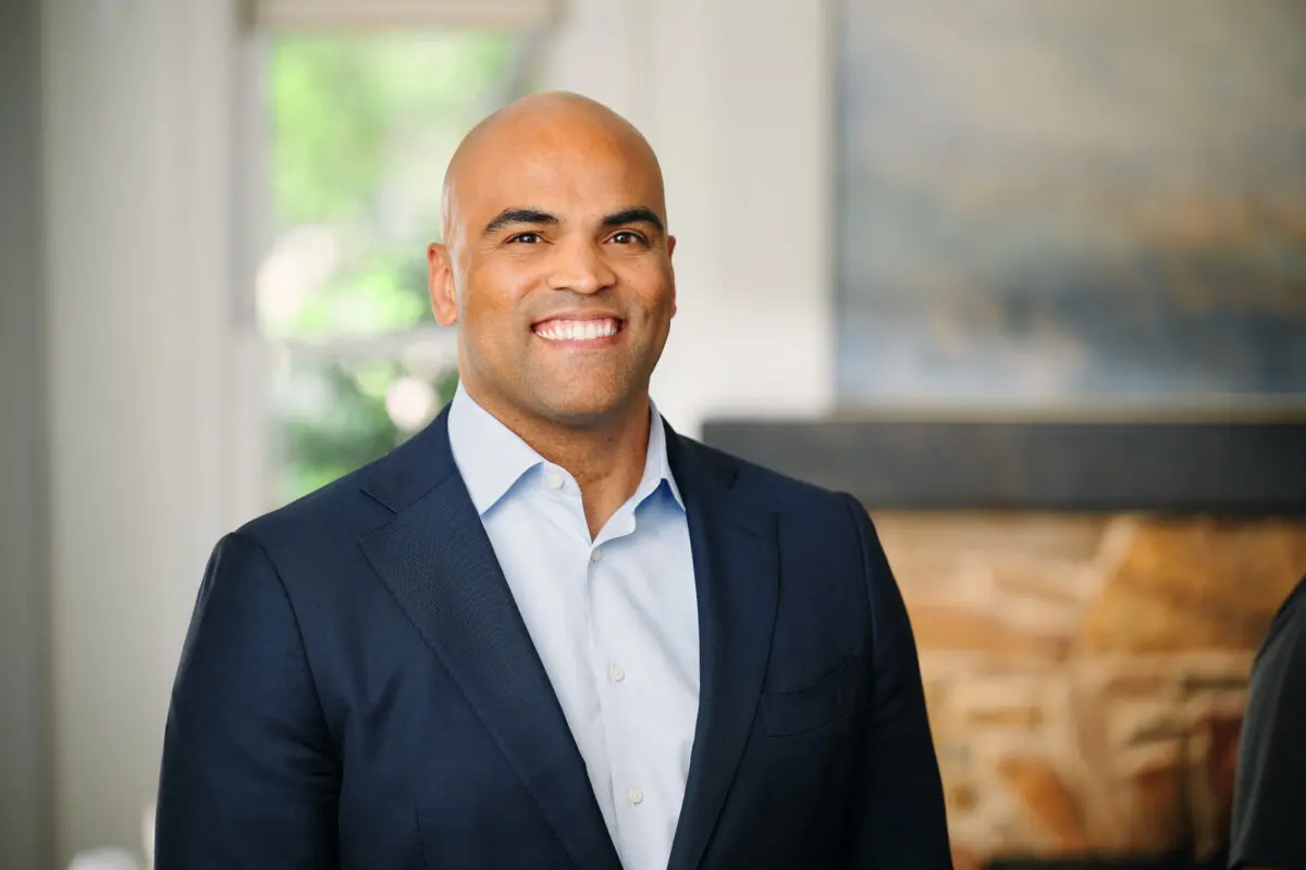 Colin Allred smiles for a portrait.