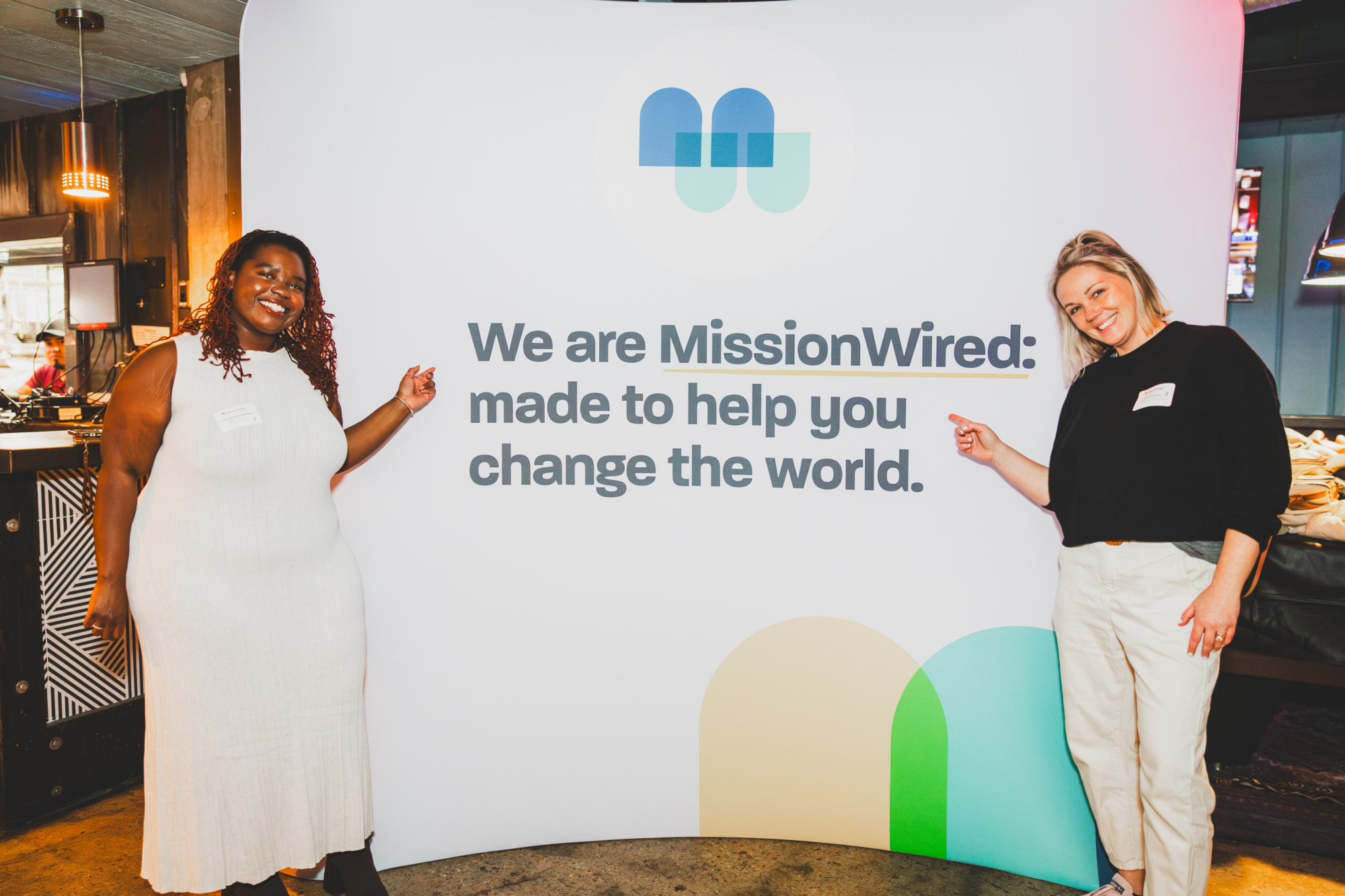 Two MissionWired staff members celebrate at our Election Night Watch Party.