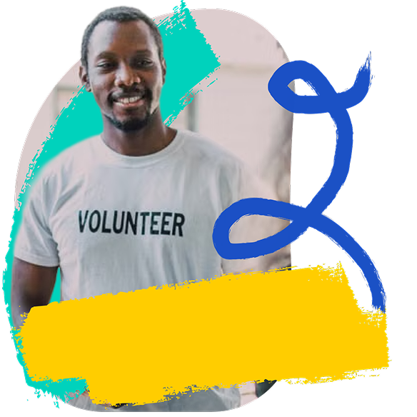 A volunteer smiles at the camera.